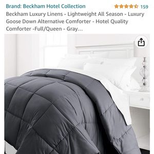 Black down alternative queen bed comforter.